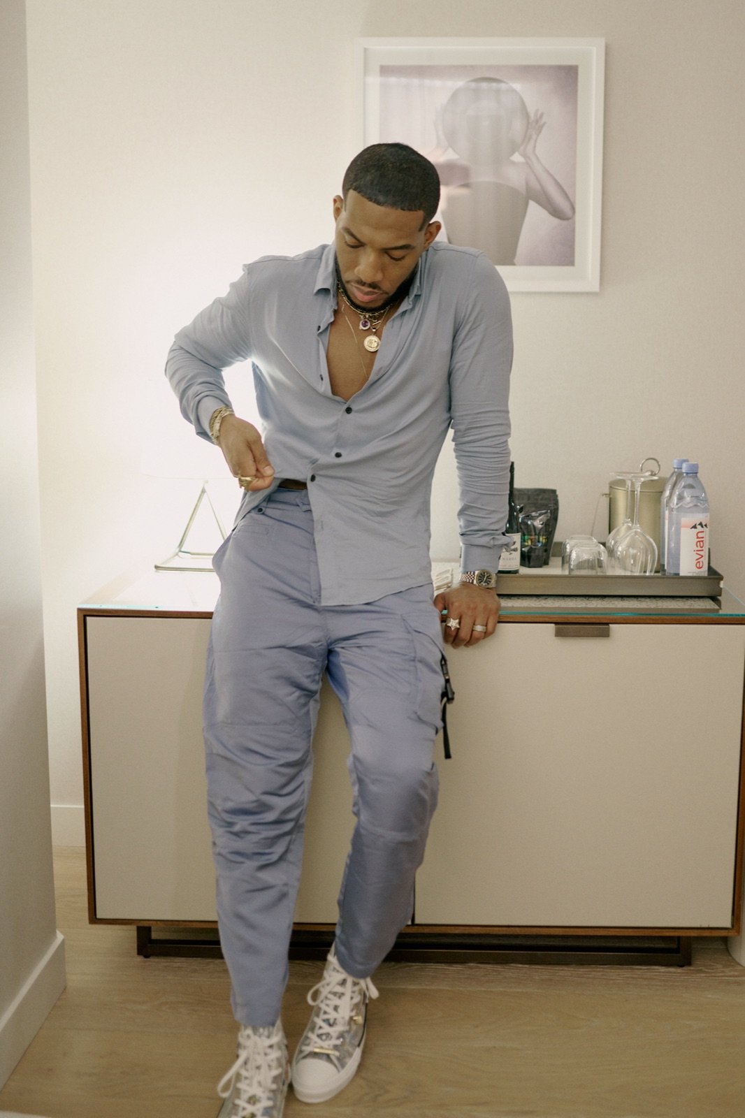 Blue shirt, buttoning up