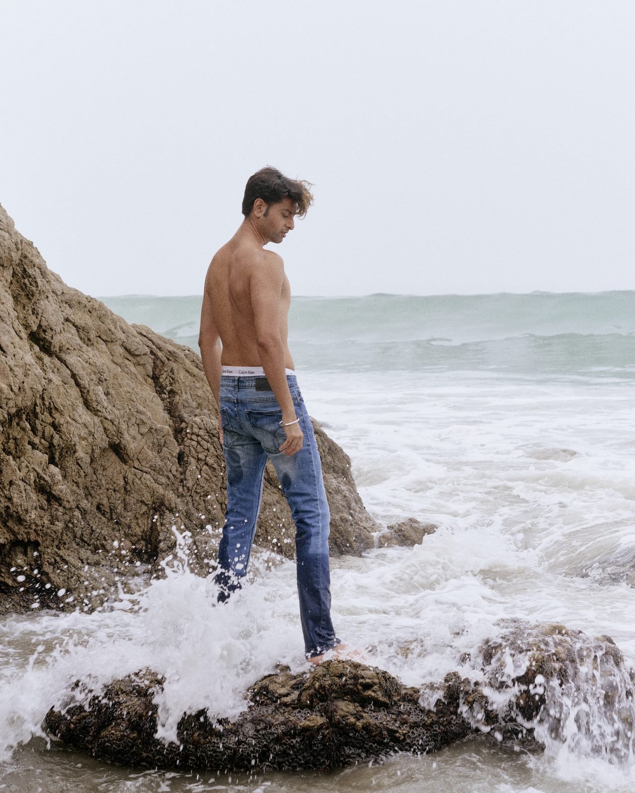 Shirtless, beach rocks