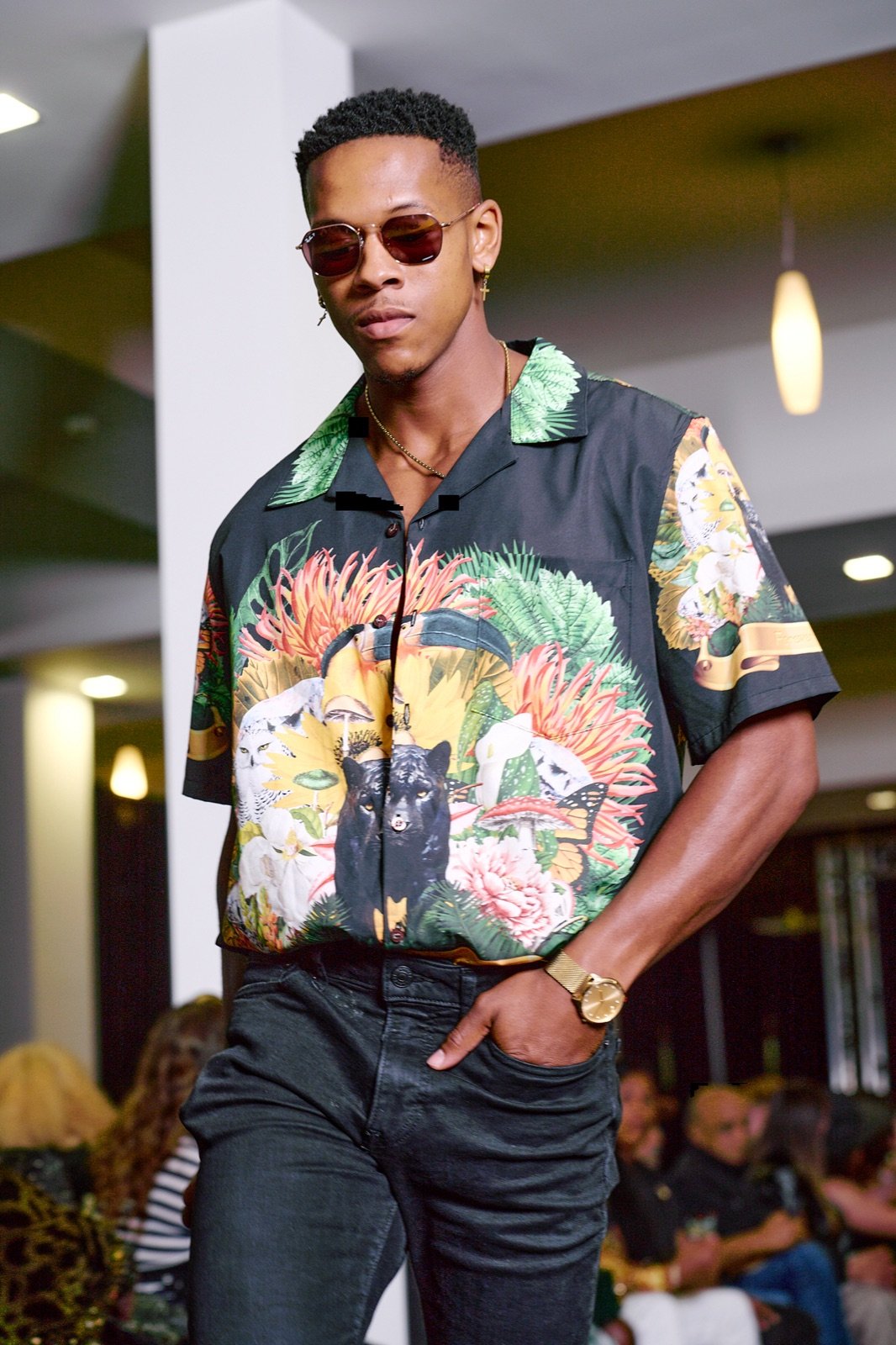 Tropical print shirt and sunglasses
