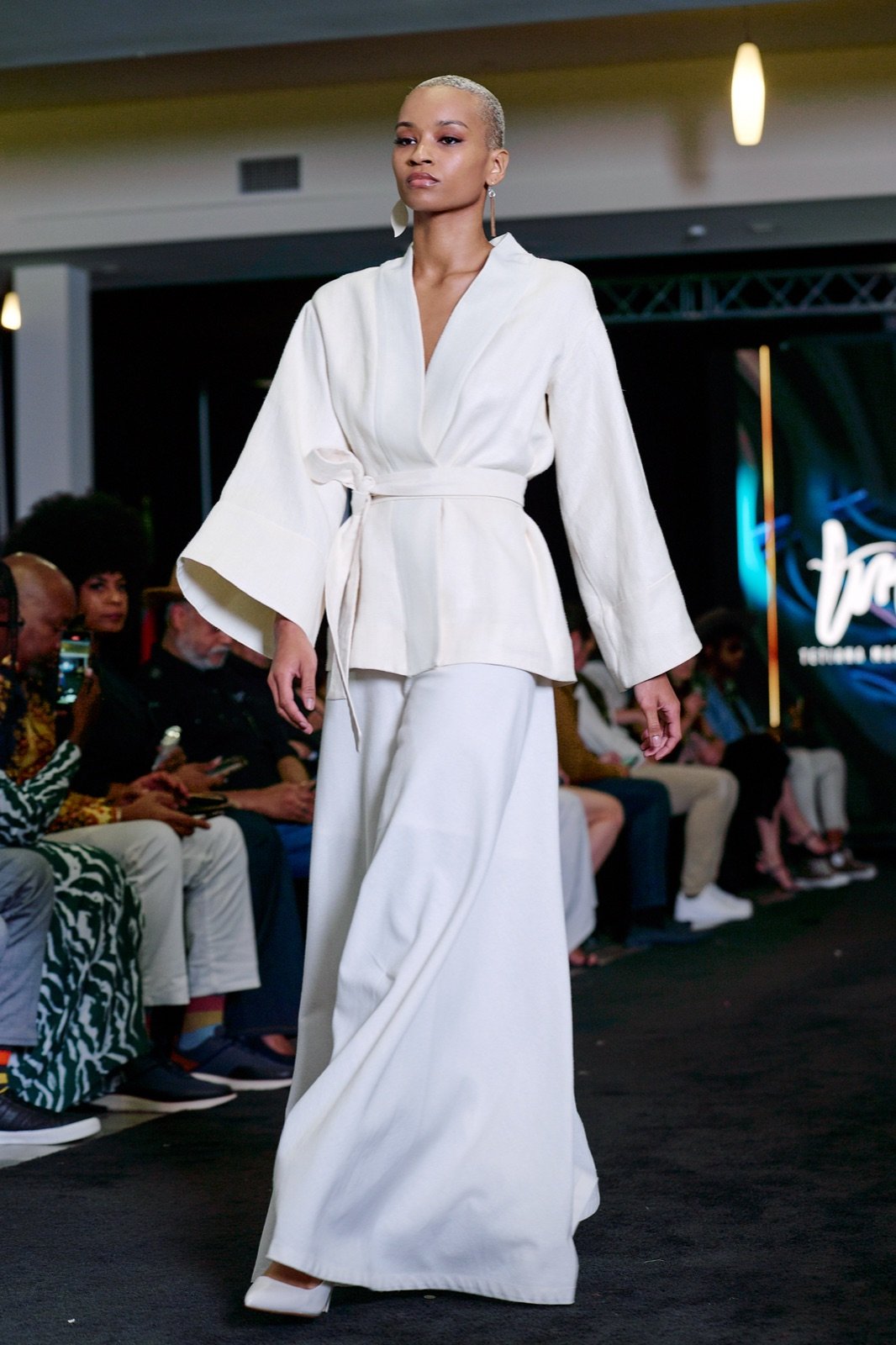 White wrap top and wide trousers