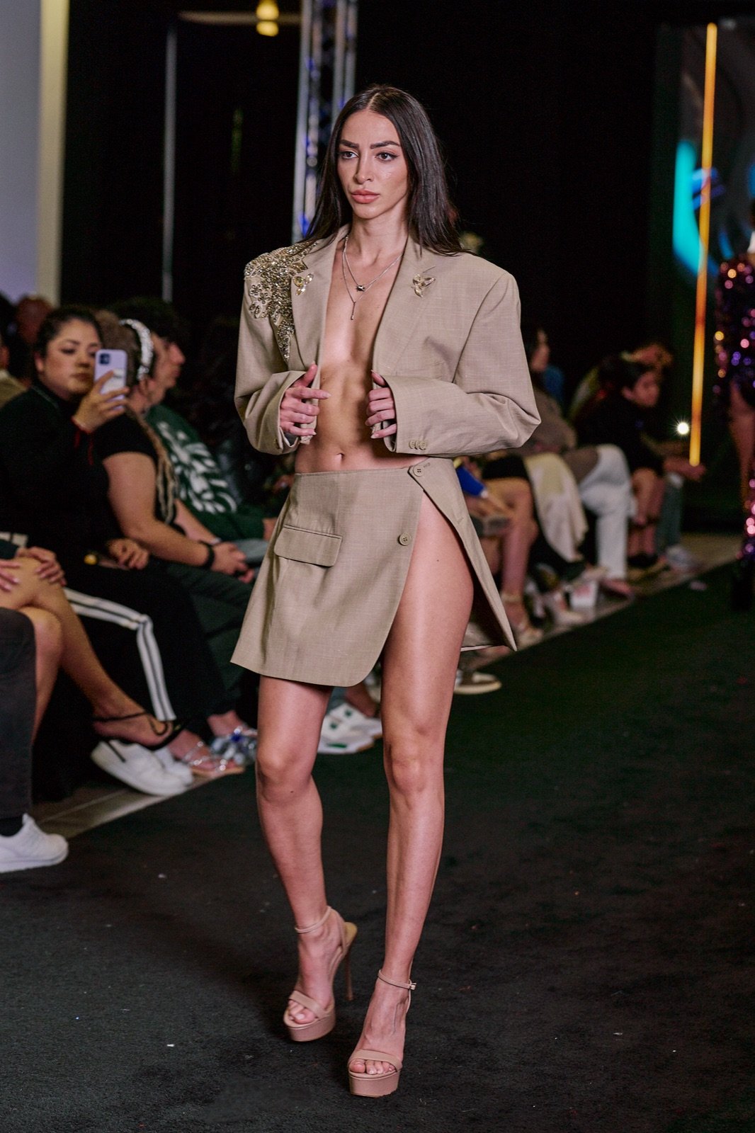 Tan cropped blazer and mini skirt