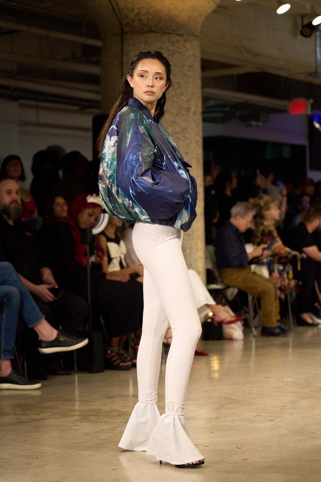 Painted bomber and white trousers