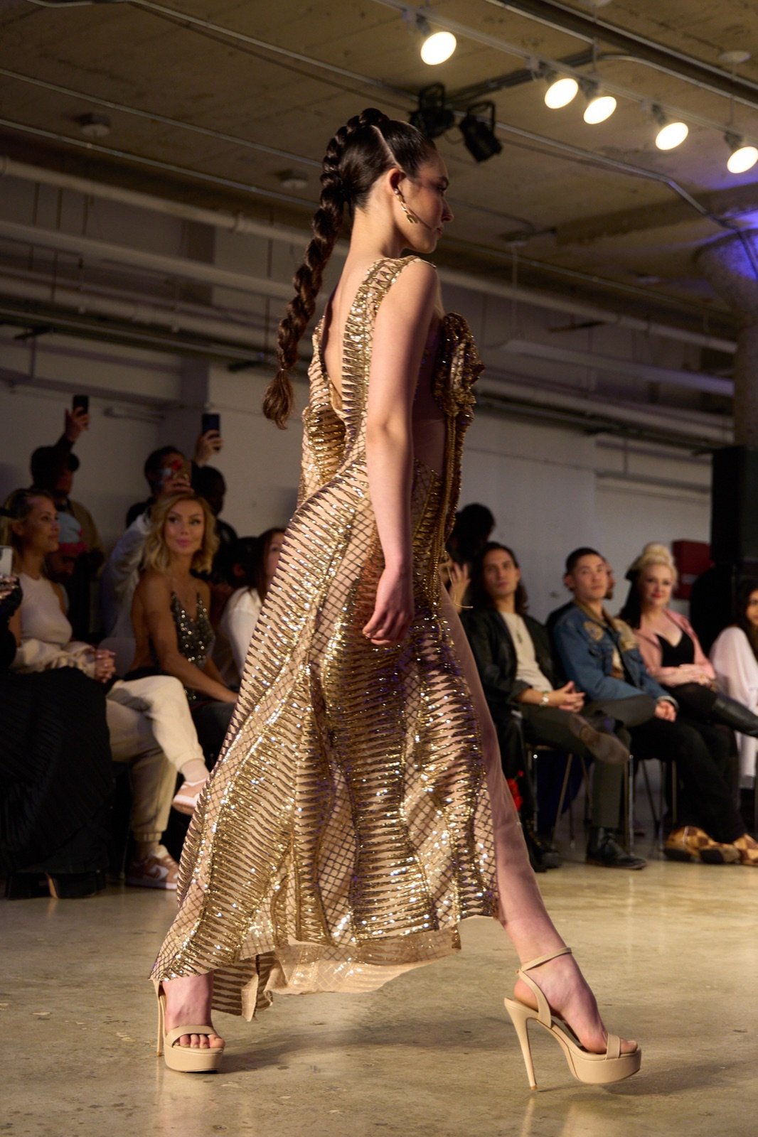 Gold striped gown in motion