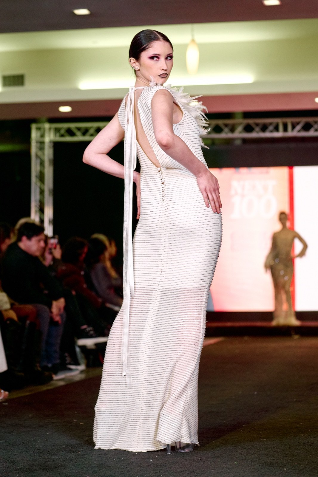 Ivory fringed gown, from behind