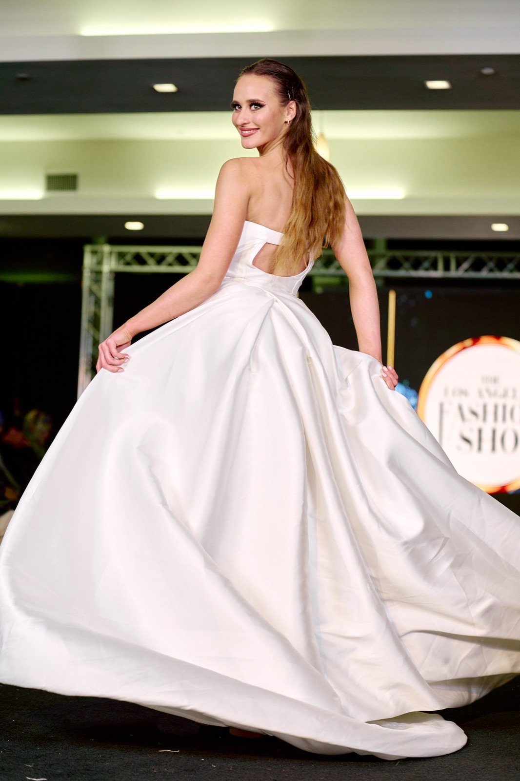 White satin ball gown, twirling
